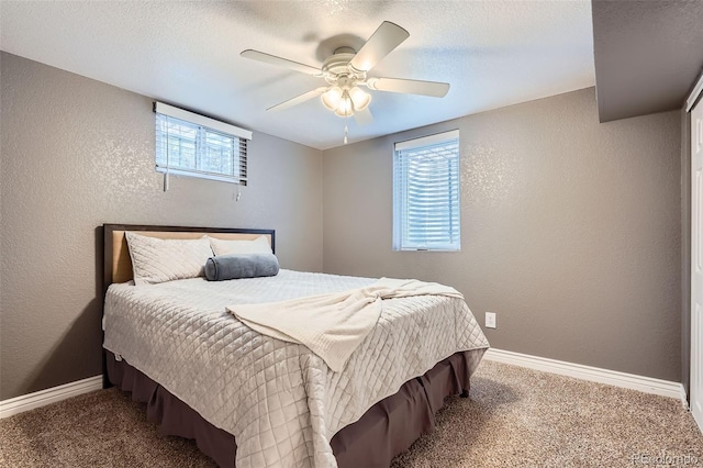 6046 Vrain St, Arvada, CO 80003 - bedroom featuring a textured wall, carpet, baseboards, a ceiling fan, and a textured ceiling