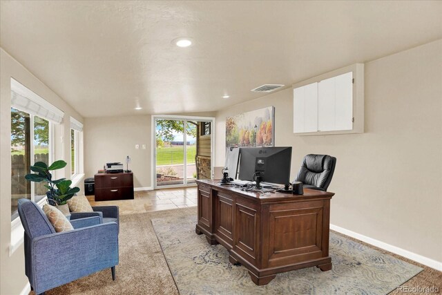office with baseboards and recessed lighting