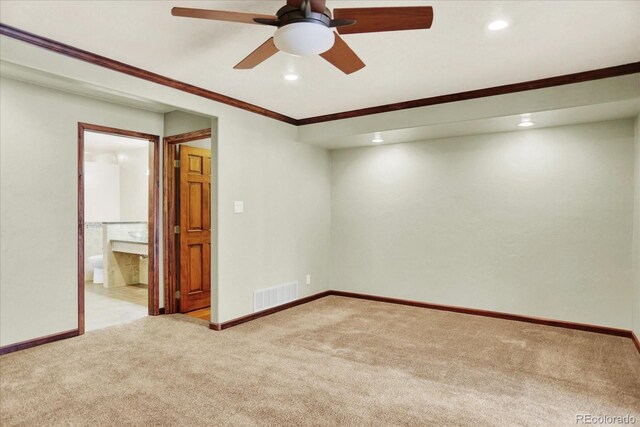 unfurnished room with carpet flooring, recessed lighting, a ceiling fan, baseboards, and crown molding