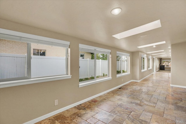 7895 W 67th Ave, Arvada, CO 80004 - unfurnished sunroom with a skylight