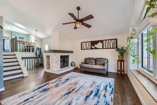 10440 W 83rd Ave, Arvada, CO 80005 - living room featuring ceiling fan, plenty of natural light, wood finished floors, and lofted ceiling