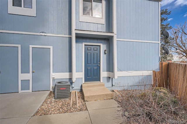 doorway to property with cooling unit