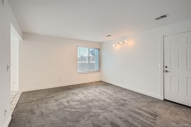 view of carpeted spare room