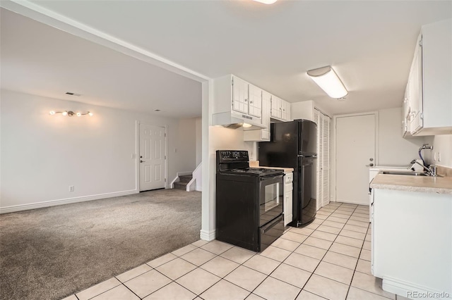 kitchen featuring white cabinetry, sink, light carpet, and black appliances