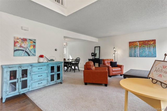 7951 S Webster Way, Littleton, CO 80128 - living area with a textured ceiling and carpet