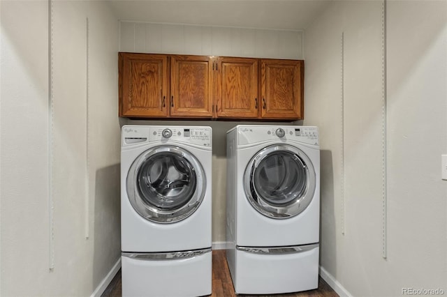 7951 S Webster Way, Littleton, CO 80128 - laundry area with independent washer and dryer, dark wood-style floors, and cabinet space