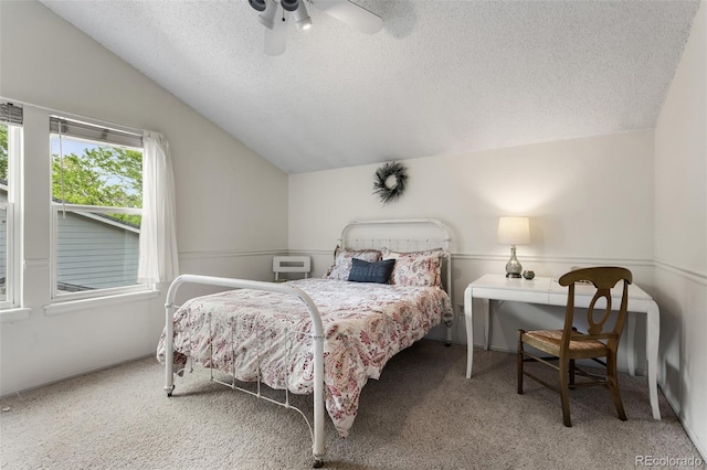 7951 S Webster Way, Littleton, CO 80128 - carpeted bedroom featuring lofted ceiling, a textured ceiling, and a ceiling fan