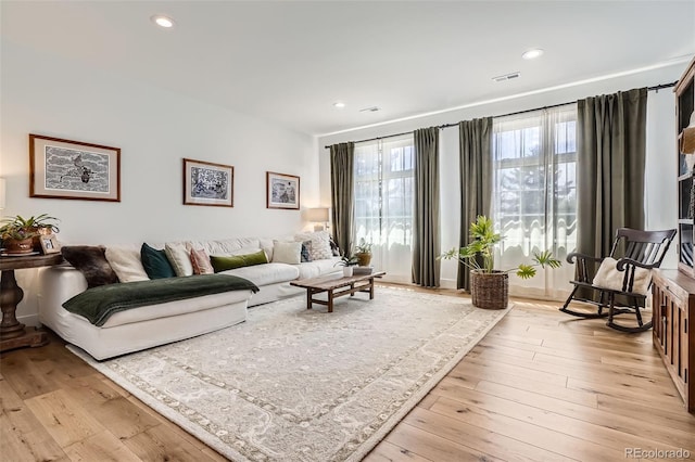 6102 S Aberdeen St, Littleton, CO 80120 - living room with light wood-style floors and recessed lighting