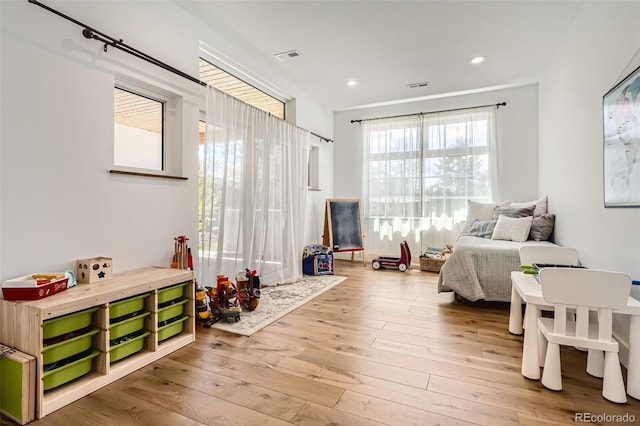 6102 S Aberdeen St, Littleton, CO 80120 - bedroom featuring light wood-style flooring and recessed lighting