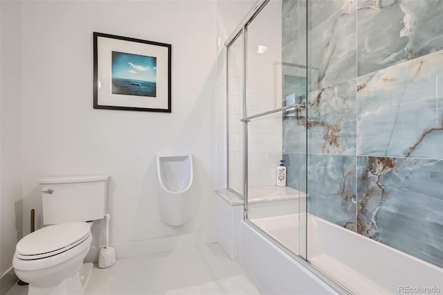 6102 S Aberdeen St, Littleton, CO 80120 - bathroom with toilet, bath / shower combo with glass door, and baseboards