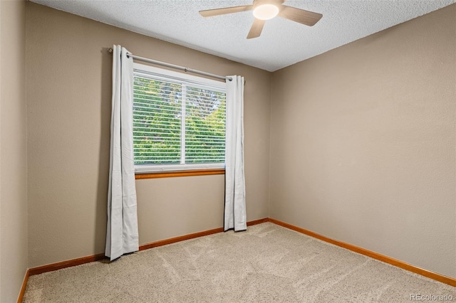20922 E Crestline Cir, Centennial, CO 80015 - unfurnished room with ceiling fan, light carpet, a textured ceiling, and baseboards
