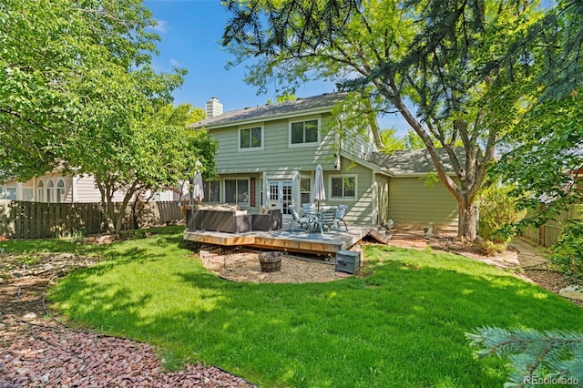 20922 E Crestline Cir, Centennial, CO 80015 - back of property with a wooden deck and a chimney