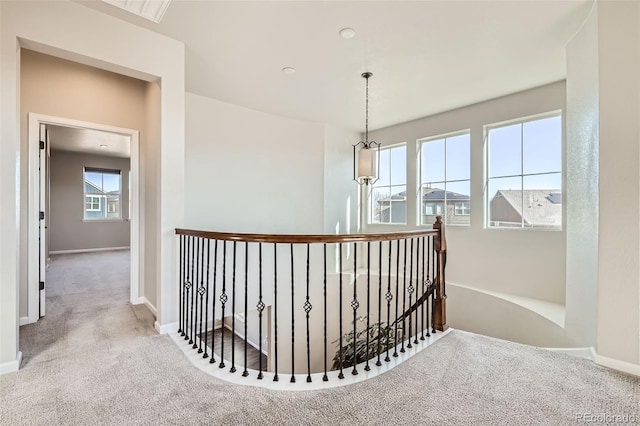 1715 Pioneer Cir, Lafayette, CO 80026 - hall featuring carpet, an upstairs landing, and baseboards