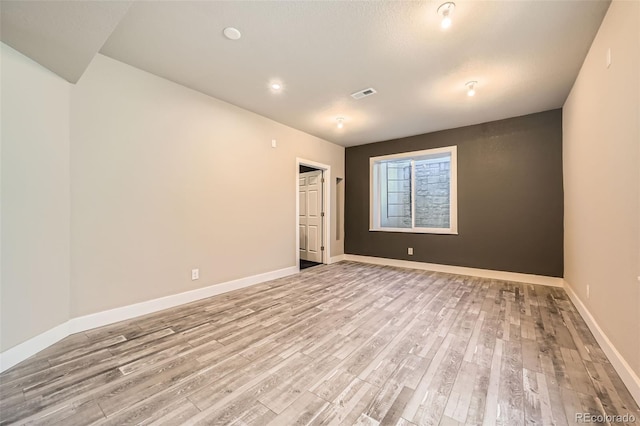 1715 Pioneer Cir, Lafayette, CO 80026 - unfurnished room featuring light wood-style floors and baseboards