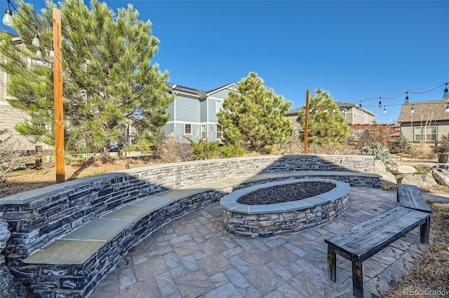 1715 Pioneer Cir, Lafayette, CO 80026 - view of patio featuring an outdoor fire pit