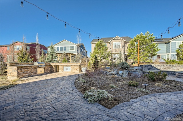 1715 Pioneer Cir, Lafayette, CO 80026 - surrounding community featuring area for grilling and a residential view