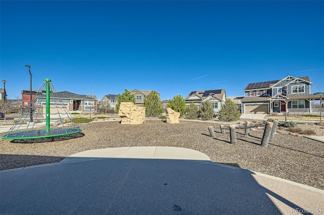 1715 Pioneer Cir, Lafayette, CO 80026 - view of yard featuring an attached garage and a residential view