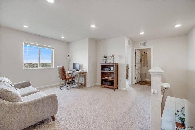 office area featuring recessed lighting, light carpet, and baseboards