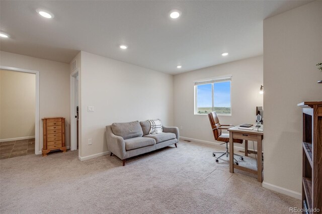 carpeted office space with recessed lighting and baseboards