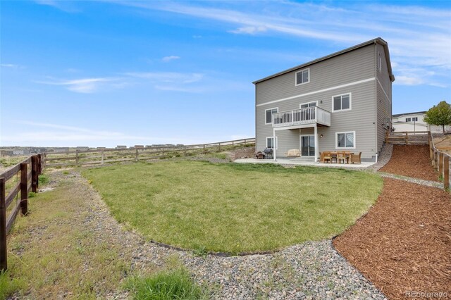 back of house with a patio