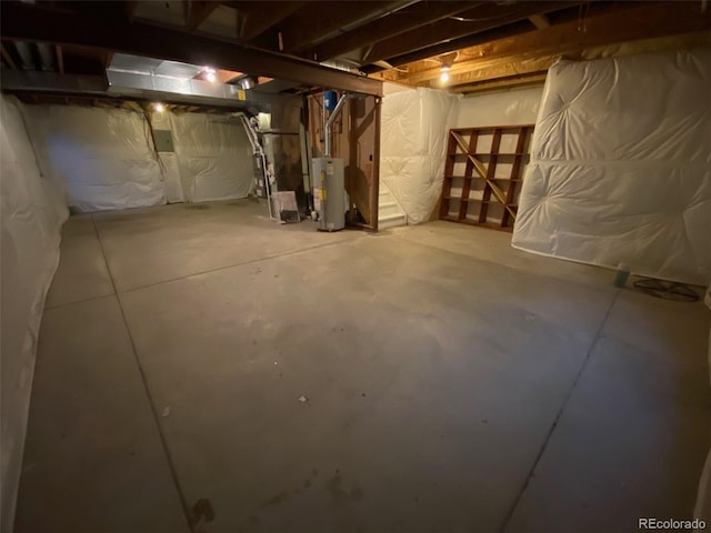 unfinished below grade area featuring gas water heater