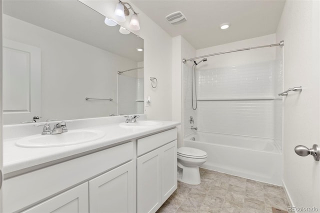 full bathroom with vanity, shower / bathtub combination, and toilet