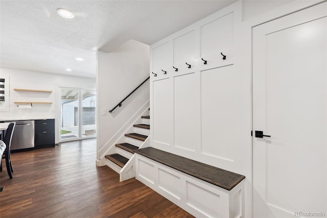 9563 W Caley Ave, Littleton, CO 80123 - mudroom with a textured ceiling, dark wood-style floors, and recessed lighting