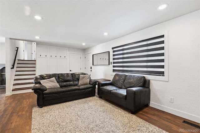 9563 W Caley Ave, Littleton, CO 80123 - living room featuring stairway, recessed lighting, and dark wood-style flooring