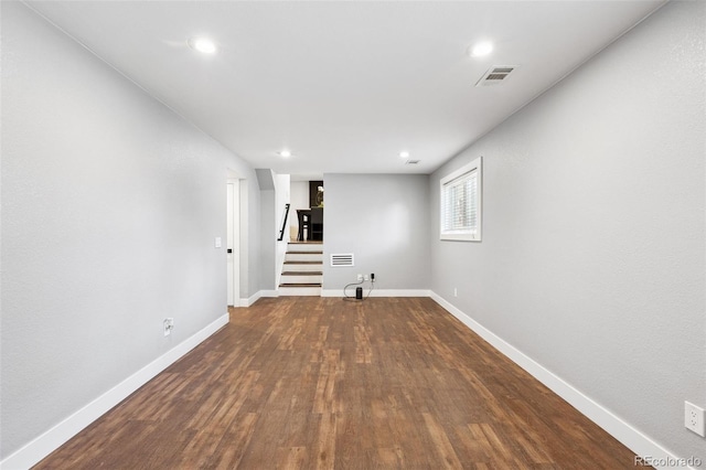 9563 W Caley Ave, Littleton, CO 80123 - basement featuring stairway, dark wood-style flooring, and recessed lighting