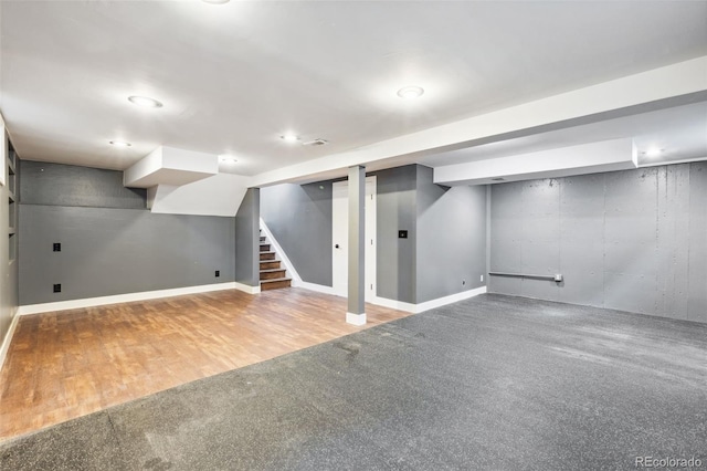 9563 W Caley Ave, Littleton, CO 80123 - finished below grade area with stairway, carpet floors, recessed lighting, and wood finished floors