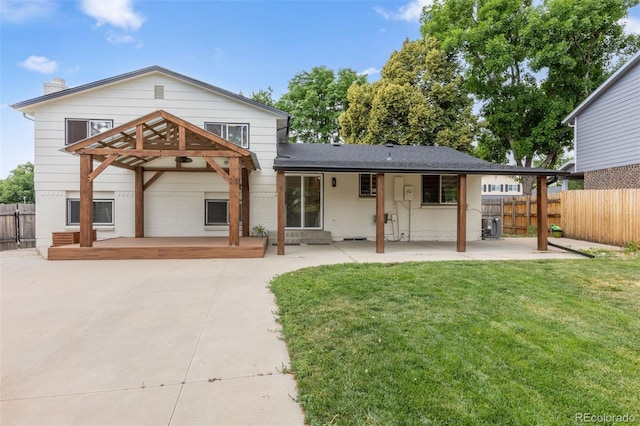 9563 W Caley Ave, Littleton, CO 80123 - rear view of house with a patio, brick siding, a chimney, and a gazebo