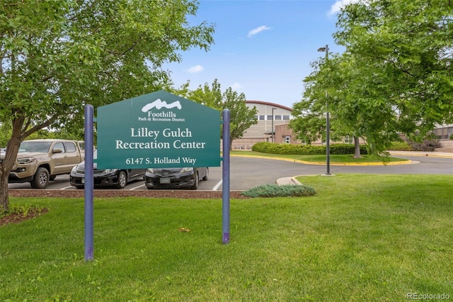 9563 W Caley Ave, Littleton, CO 80123 - community / neighborhood sign featuring a lawn
