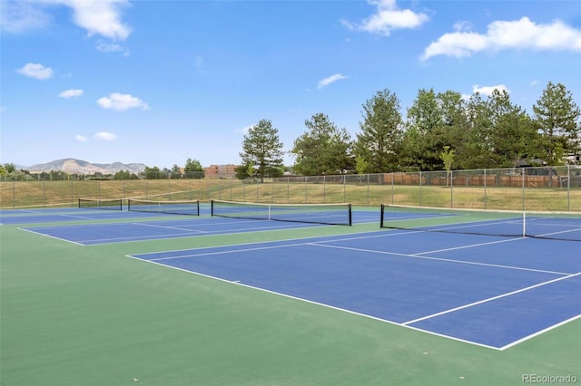 9563 W Caley Ave, Littleton, CO 80123 - view of tennis court with community basketball court and a mountain view