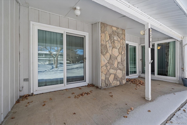 entrance to property featuring a patio