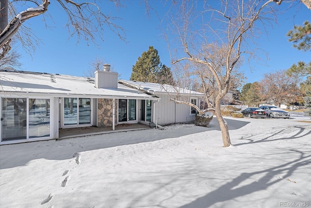 view of snow covered property