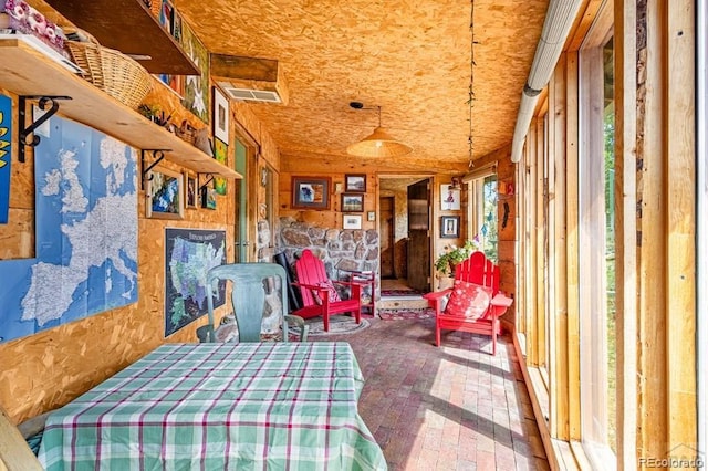 8929 Apache Dr, Beulah, CO 81023 - bedroom with brick floors