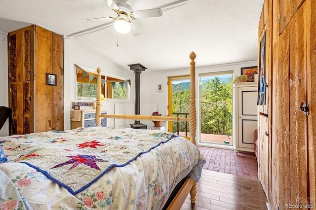 8929 Apache Dr, Beulah, CO 81023 - bedroom with access to outside and ceiling fan