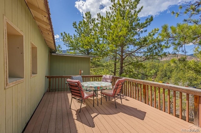8929 Apache Dr, Beulah, CO 81023 - deck with outdoor dining area