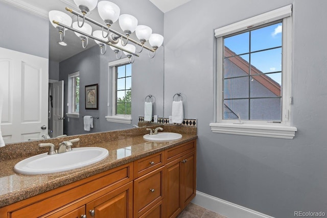 5171 Shade Tree Ln, Parker, CO 80134 - bathroom with double vanity and baseboards