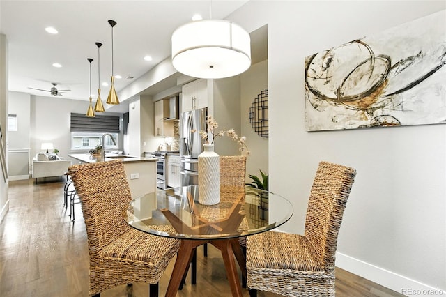 3431 W 16th Ave, Denver, CO 80204 - dining area featuring a ceiling fan, wood finished floors, and recessed lighting