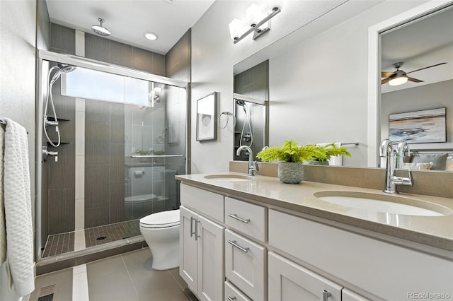 3431 W 16th Ave, Denver, CO 80204 - full bathroom featuring tile patterned floors, double vanity, a shower stall, a ceiling fan, and recessed lighting