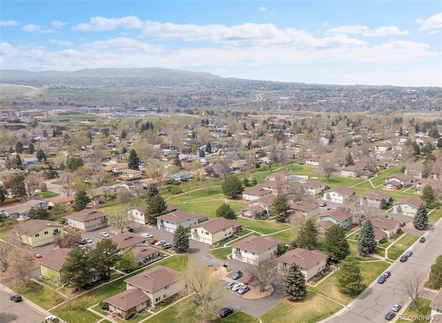bird's eye view with a mountain view and a residential view
