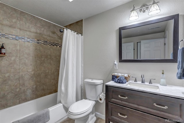 full bathroom featuring shower / bath combination with curtain, toilet, a textured ceiling, and vanity