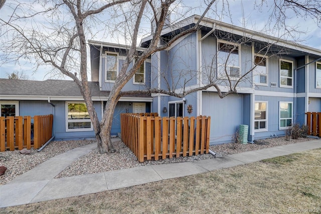 view of front of house with fence