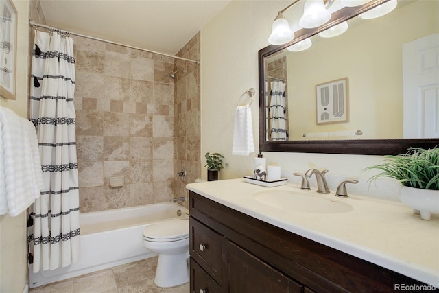 full bathroom featuring vanity, toilet, tile patterned flooring, and shower / tub combo with curtain