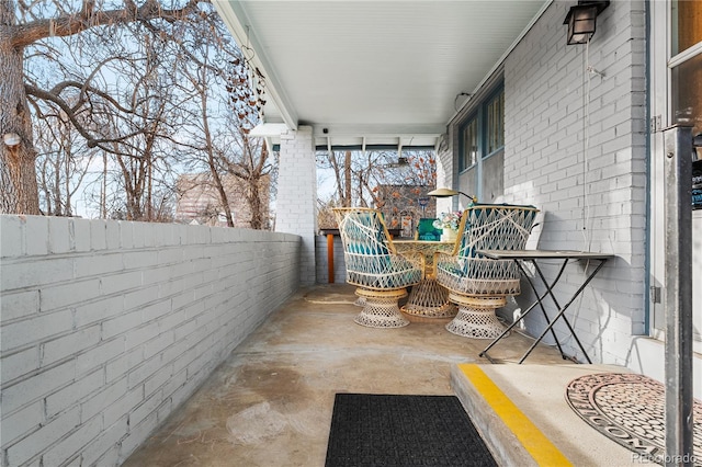 balcony featuring a porch