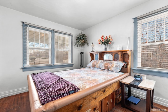 bedroom featuring dark wood-type flooring