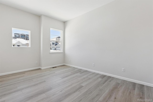 empty room featuring light wood-type flooring