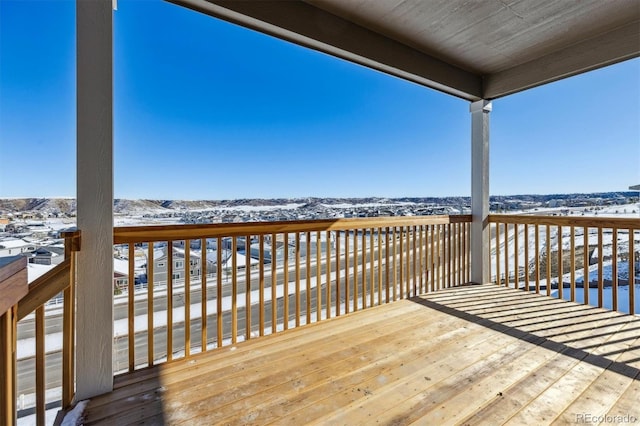 view of snow covered deck