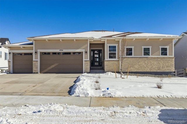 view of front of property with a garage